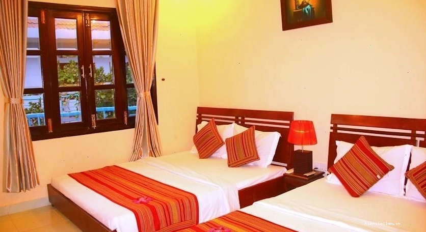 Phòng ngủ 4 người tại Sóng Biển Xanh Resort rộng rãi và thoáng đãng